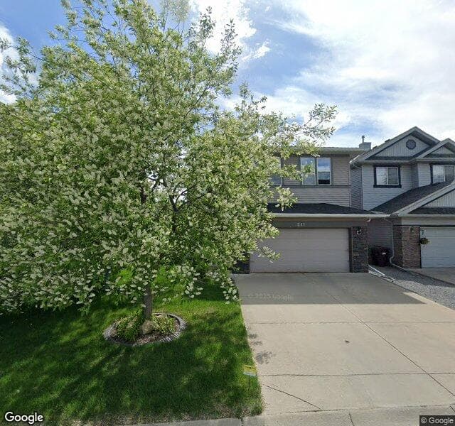 Street view of 211 Chaparral Ravine View SE, Calgary