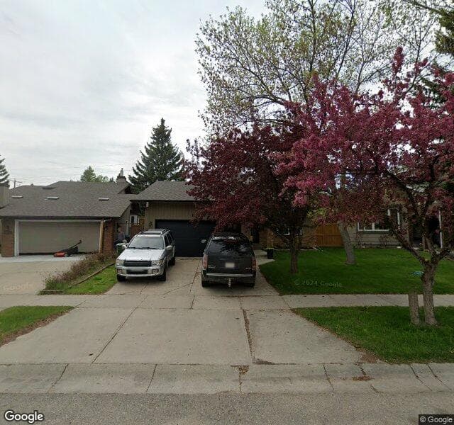 Street view of 14007 Deer Run Boulevard SE, Calgary