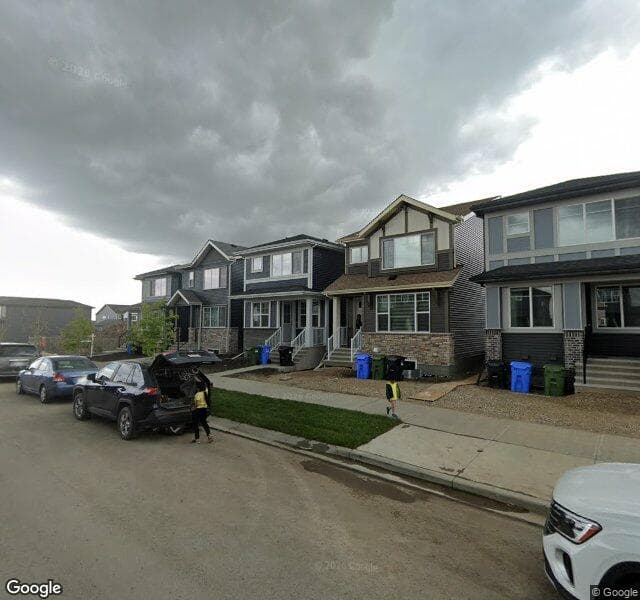 Street view of 878 Creekside Boulevard SW, Calgary