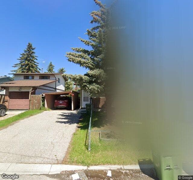Street view of 1008 Woodview Crescent SW, Calgary
