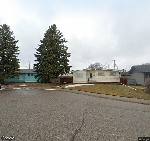Street view of 907 Avonlea Place SE, Calgary