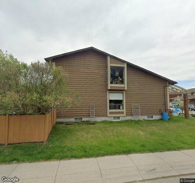 Street view of 96 Deerbrook Road SE, Calgary