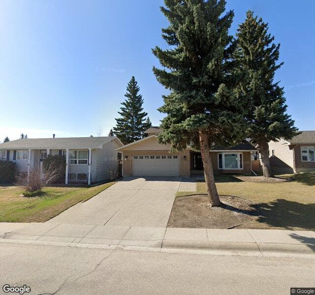 Street view of 1127 Lake Sylvan Drive SE, Calgary