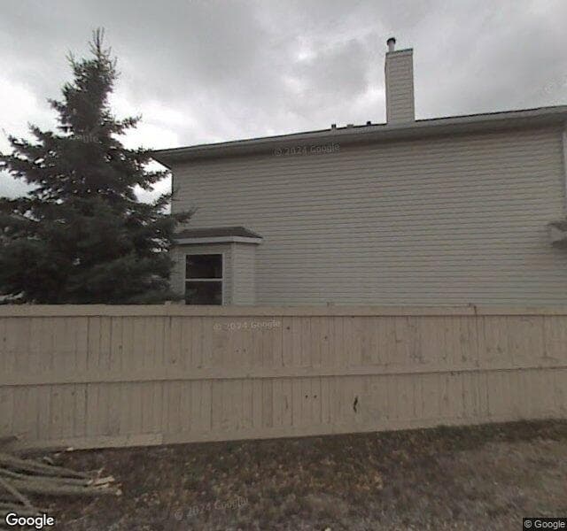 Street view of 912 Harvest Hills Drive NE, Calgary