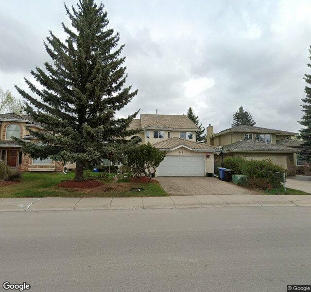 Street view of 1016 Shawnee Drive SW, Calgary