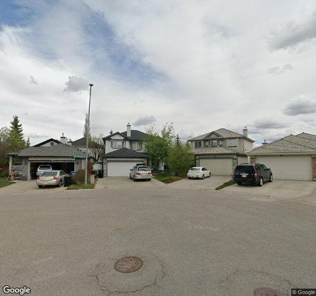 Street view of 331 Rocky Ridge Bay NW, Calgary