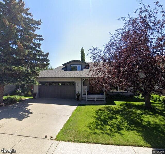 Street view of 79 Strathbury Circle SW, Calgary