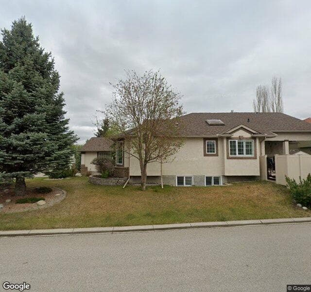 Street view of 1673 Evergreen Drive SW, Calgary