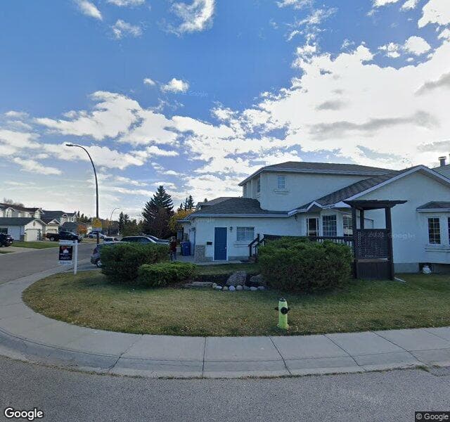Street view of 26 Riverside Close SE, Calgary