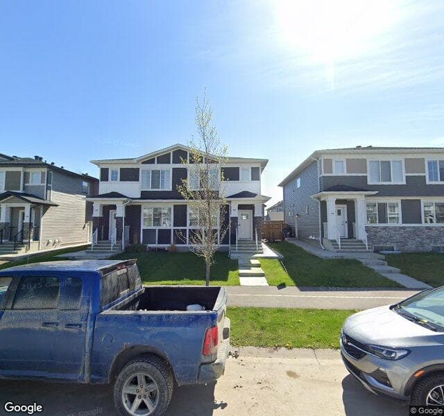 Street view of 166 Creekside Drive SW, Calgary