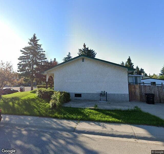 Street view of 128 Oakridge Place SW, Calgary