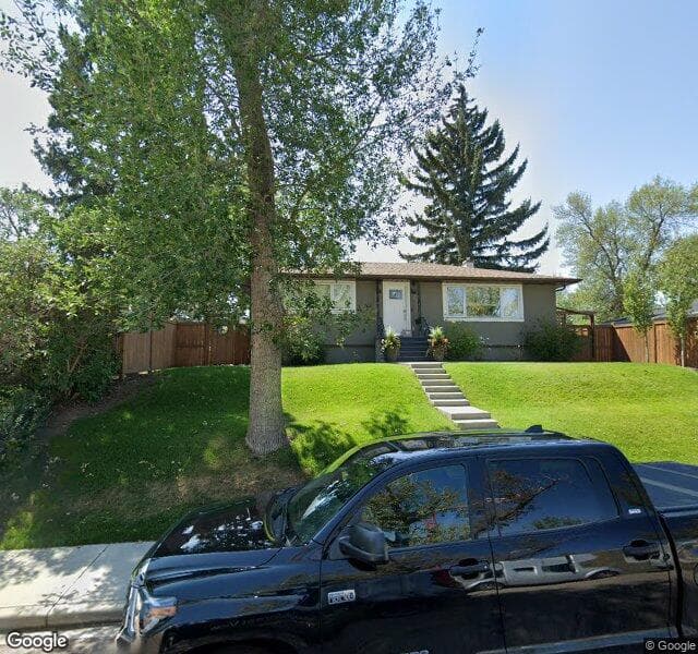 Street view of 7 Meadowview Road SW, Calgary