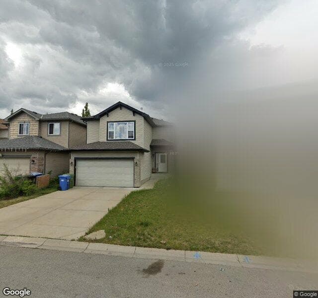 Street view of 48 Everwoods Close SW, Calgary