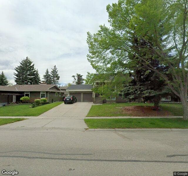 Street view of 14207 Deer Ridge Drive SE, Calgary