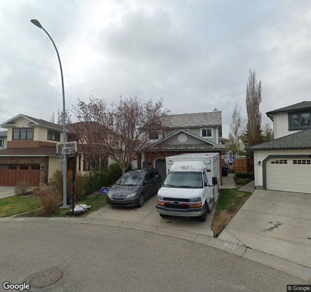 Street view of 234 Hidden Cove NW, Calgary