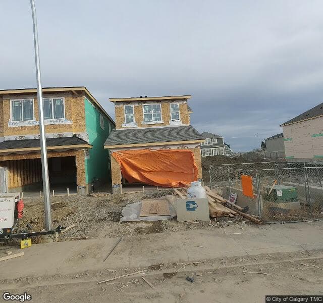 Street view of 230 Magnolia Way SE, Calgary