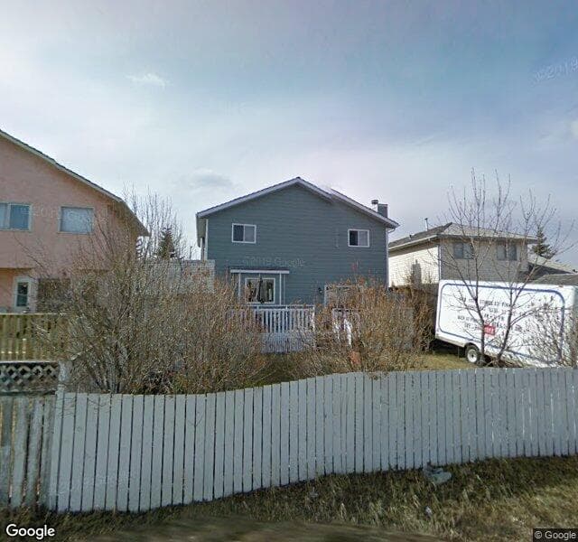 Street view of 84 Harvest Hills Drive NE, Calgary