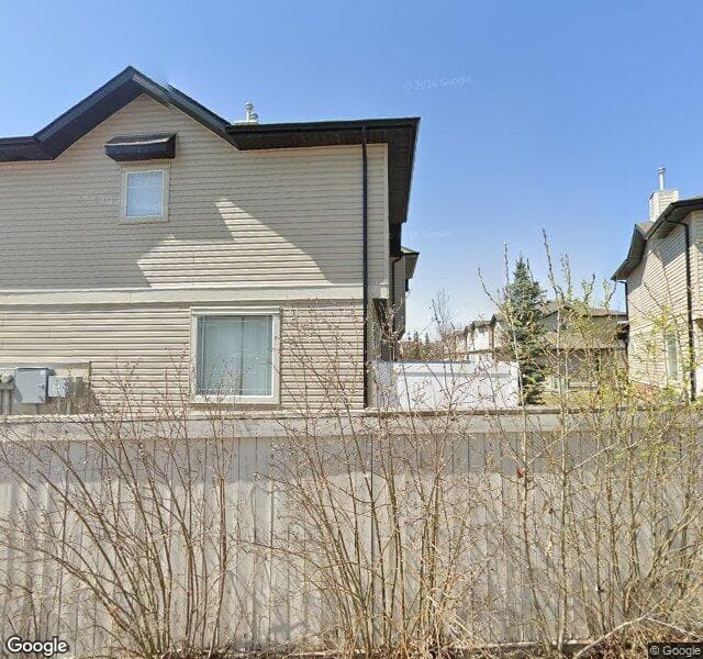Street view of 90 Saddlebrook Point NE, Calgary