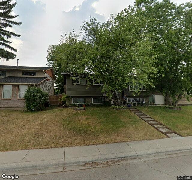 Street view of 1911 Pinetree Crescent NE, Calgary
