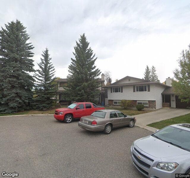 Street view of 32 Cedarwood Bay SW, Calgary