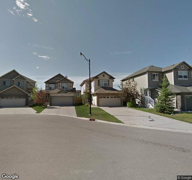 Street view of 210 Silverado Range Cove SW, Calgary