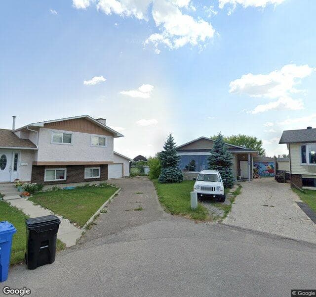 Street view of 28 Radcliffe Bay SE, Calgary