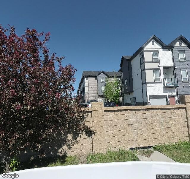 Street view of 310-11 Evanscrest Mews NW, Calgary