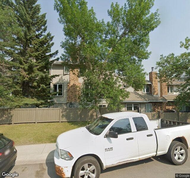 Street view of 223 Coachway Lane SW, Calgary