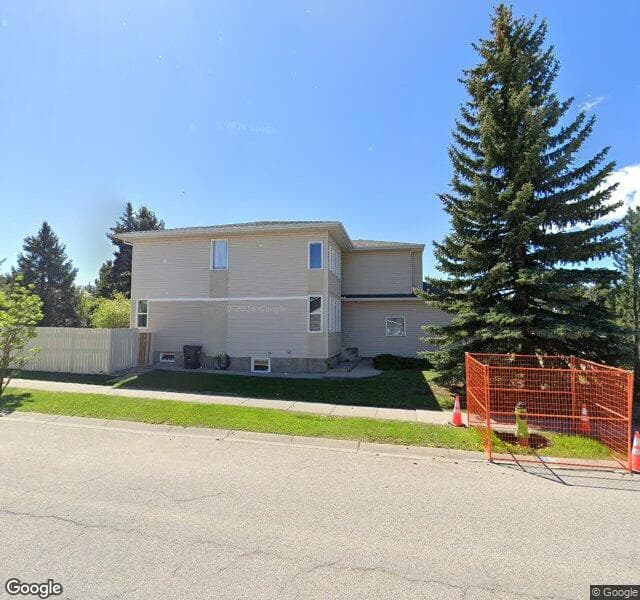 Street view of 4 Wood Valley Rise SW, Calgary
