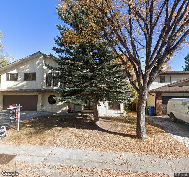 Street view of 512 Woodpark Crescent SW, Calgary