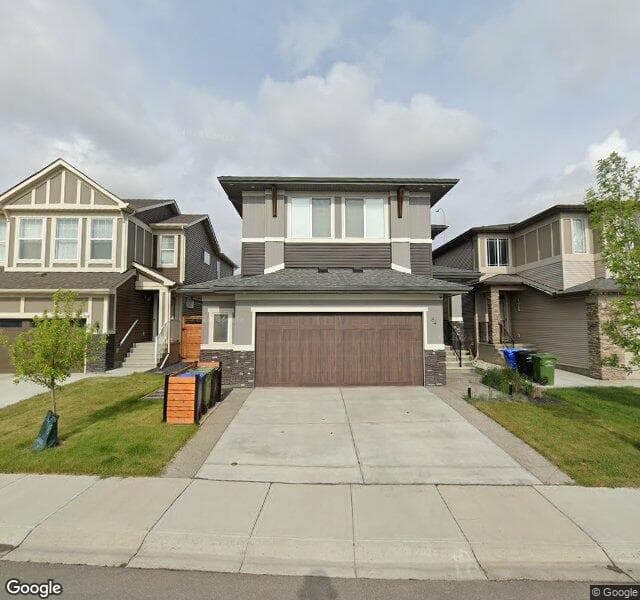 Street view of 84 Sage Bluff Manor NW, Calgary