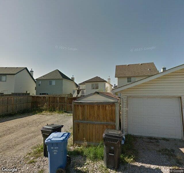 Street view of 165 Copperfield Mews SE, Calgary