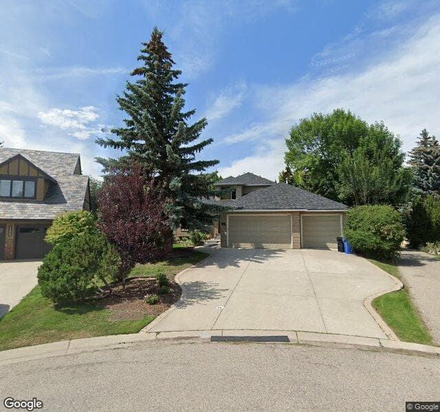Street view of 135 Pumpvalley Court SW, Calgary