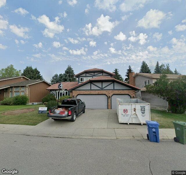 Street view of 75 Woodacres Crescent SW, Calgary