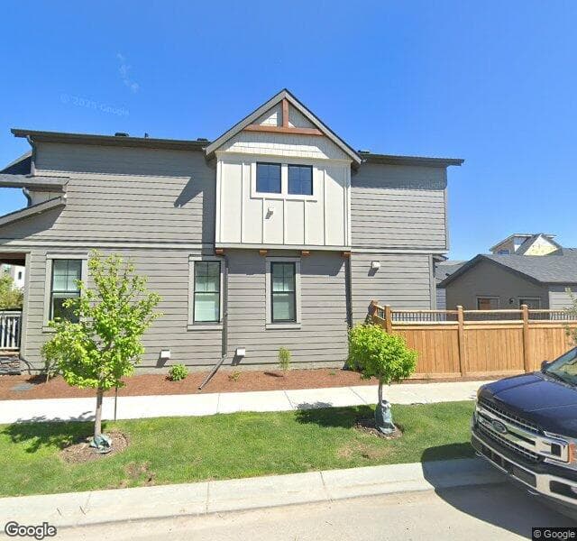 Street view of 120 Treeline Manor SW, Calgary