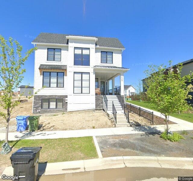 Street view of 235 Treeline View SW, Calgary