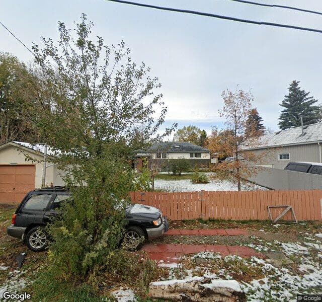 Street view of 2056 Cottonwood Crescent SE, Calgary