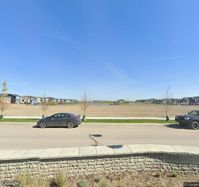 Street view of 30 Creekside Villas SW, Calgary
