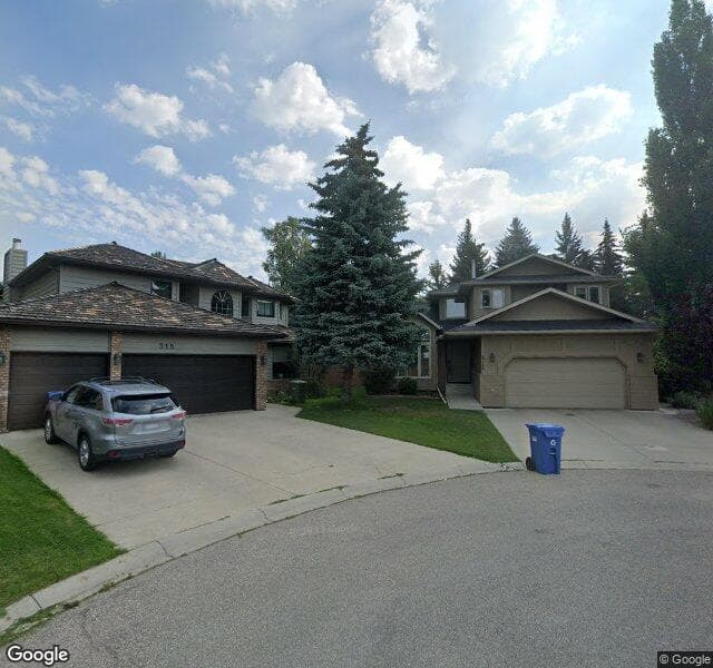 Street view of 311 Woodhaven Bay SW, Calgary