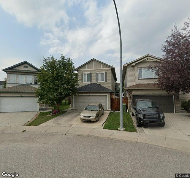 Street view of 32 Tuscany Ravine Crescent NW, Calgary