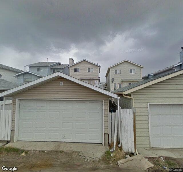 Street view of 6979 Laguna Way NE, Calgary