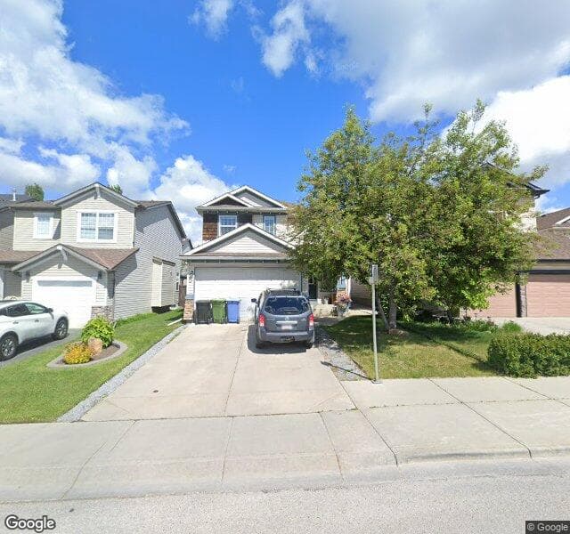 Street view of 322 Tuscany Drive NW, Calgary