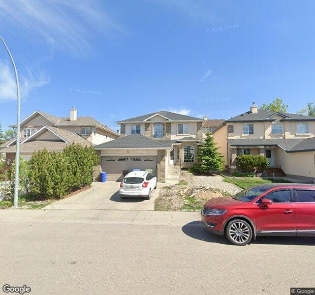Street view of 16 Simcrest Point SW, Calgary