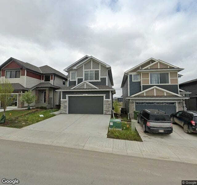 Street view of 814 Bluerock Way SW, Calgary