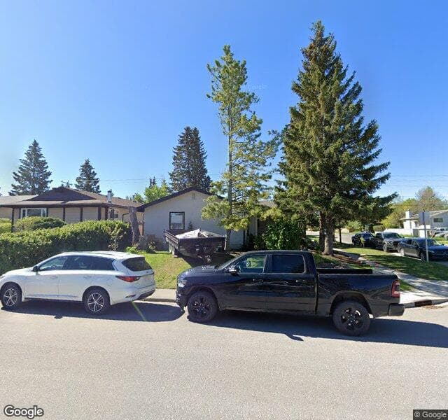 Street view of 10704 Oakfield Drive SW, Calgary