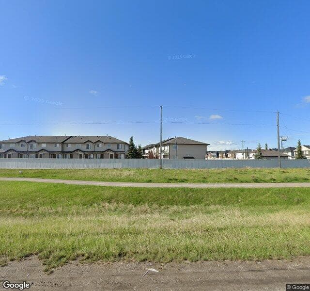 Street view of 328 Saddlebrook Point NE, Calgary