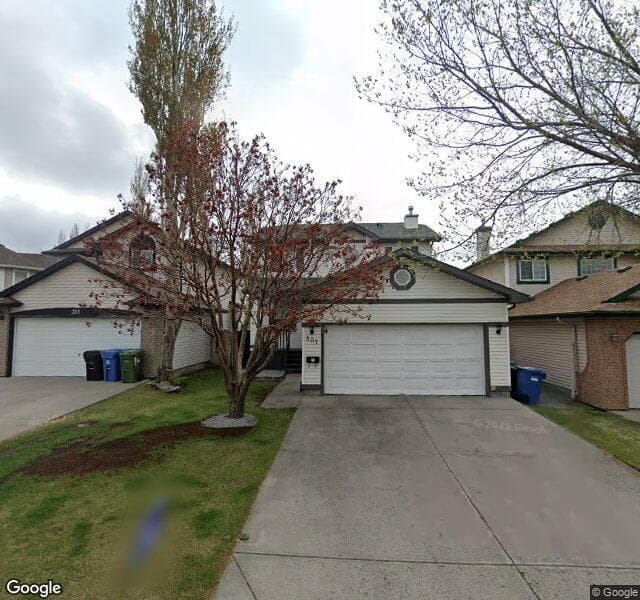 Street view of 307 Hidden Cove NW, Calgary