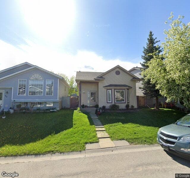 Street view of 67 Rivercrest Circle SE, Calgary
