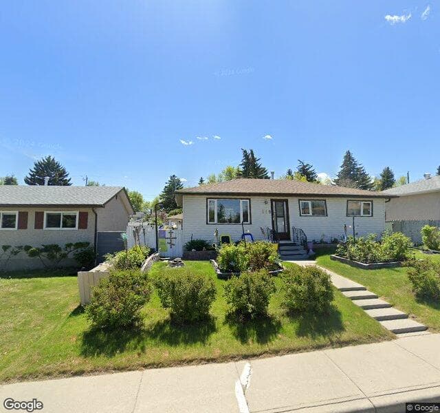 Street view of 219 Tache Avenue NW, Calgary
