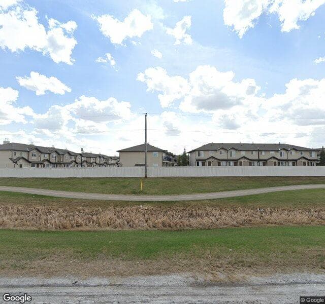 Street view of 244 Saddlebrook Point NE, Calgary
